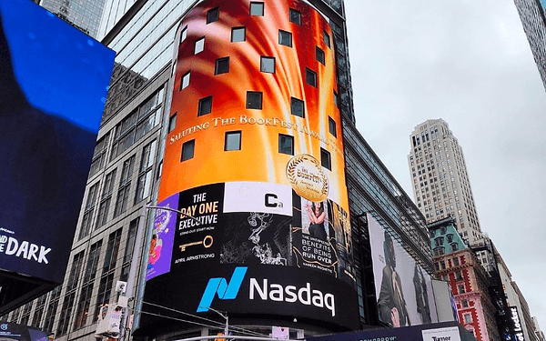 Author speaking on stage